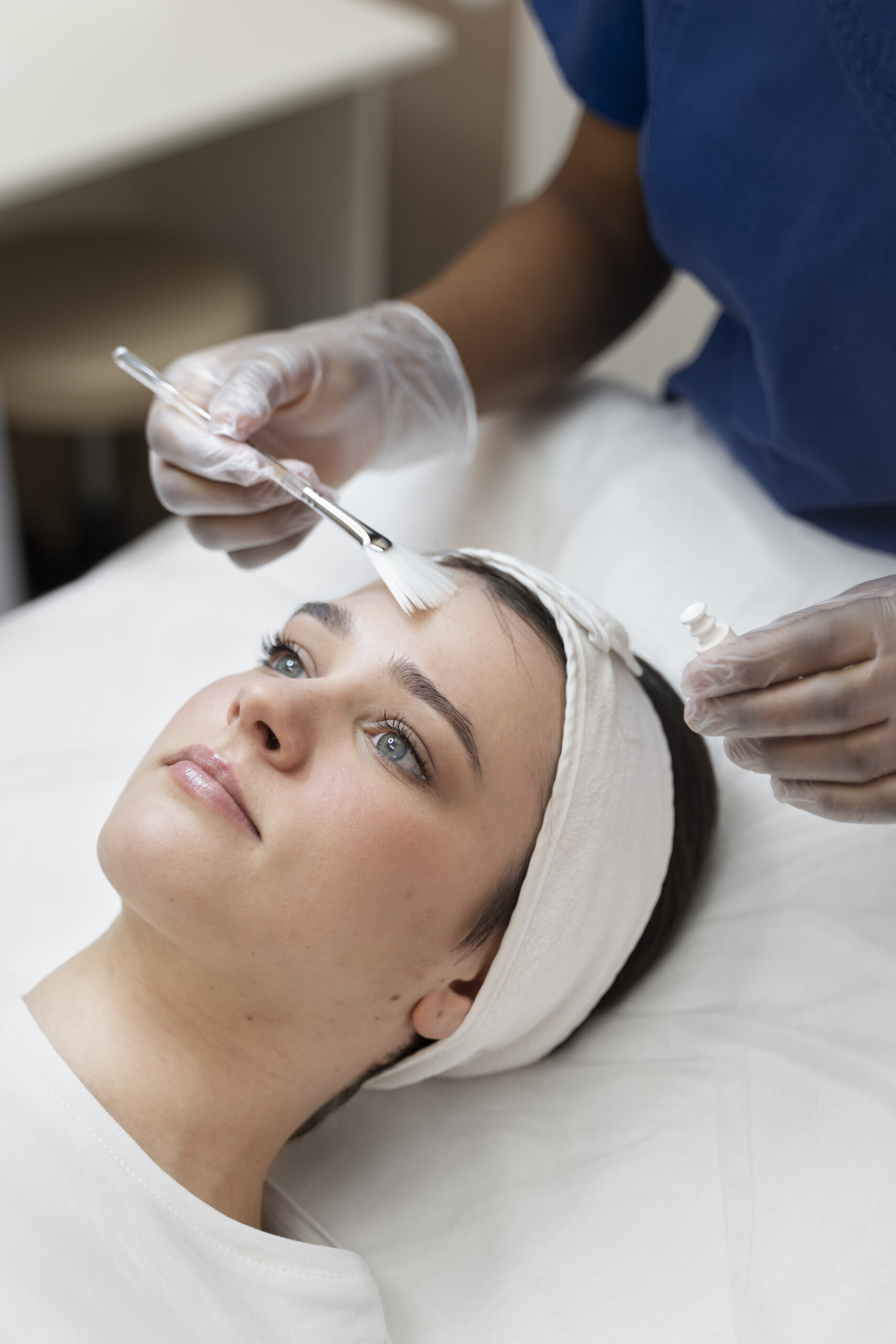 person getting micro needling beauty treatment scaled